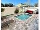 Cozy backyard pool with poolside seating and lounge chairs for relaxation at 244 Villa Domani Cir, Davenport, FL 33896