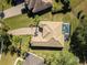 Home with pool and tile roof, bird's-eye view at 25459 Hawks Run Ln, Sorrento, FL 32776