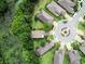 Aerial view of the house, showcasing lush backyard landscaping, proximity to water, and neighborhood at 513 San Sebastian Ct, Davenport, FL 33837