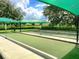 Enjoy the community bocce ball courts with shaded seating for relaxing after a game at 513 San Sebastian Ct, Davenport, FL 33837