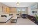 Spacious living room with stylish decor, modern furniture, and bright natural light at 513 San Sebastian Ct, Davenport, FL 33837