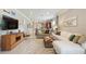 Spacious living room with stylish decor, modern furnishings, and abundant natural light at 513 San Sebastian Ct, Davenport, FL 33837