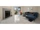 Living room features a fireplace and comfortable seating at 707 Carpenters Way # 45, Lakeland, FL 33809