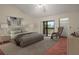 Spacious main bedroom with private balcony access at 707 Carpenters Way # 45, Lakeland, FL 33809