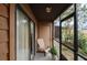 Relaxing screened porch with outdoor seating at 707 Carpenters Way # 45, Lakeland, FL 33809