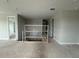 Hallway with safety railing and multiple doorways, connecting various areas of the home at 977 Hawksnest Pt, Oviedo, FL 32765