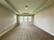 Large bedroom with tray ceiling, recessed lighting, neutral carpet, and lots of natural light at 987 Hawksnest Pt, Oviedo, FL 32765