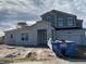 Two-story home featuring a two-car garage, covered porch, and a combination of stucco and siding at 987 Hawksnest Pt, Oviedo, FL 32765