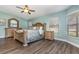 Spacious bedroom with large bed and ceiling fan at 139 Stratford Ct, Haines City, FL 33844