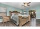 Main bedroom with patio access and ceiling fan at 139 Stratford Ct, Haines City, FL 33844