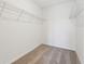 Walk-in closet featuring carpeted floor and wire shelving for storage at 2735 Virginia Pine Dr, Bartow, FL 33830