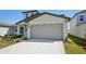 A beautiful home with a two car garage and a well maintained lawn at 2735 Virginia Pine Dr, Bartow, FL 33830