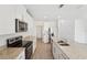 Well-lit kitchen showcasing stainless appliances, granite countertops, and a kitchen island at 2735 Virginia Pine Dr, Bartow, FL 33830