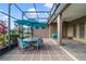 Covered patio features a dining area and outdoor seating, great for entertaining at 27601 Country Stone Ct, Leesburg, FL 34748