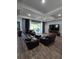 Cozy living room with tile floors, recessed lights and sliding glass doors to the patio at 3811 Island Green Way, Orlando, FL 32824