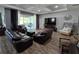 Living room showcasing tile floors, recessed lighting and large sliding doors to the patio at 3811 Island Green Way, Orlando, FL 32824