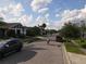 A street lined with well-maintained homes at 3811 Island Green Way, Orlando, FL 32824