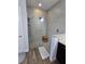 Modern walk-in shower with neutral tiles, a shower bench and granite surround at 3811 Island Green Way, Orlando, FL 32824