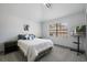 Spacious bedroom with a queen-size bed and ceiling fan at 465 Songbird Way, Apopka, FL 32712