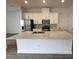 Modern kitchen with stainless steel appliances and large island at 5015 Dancy Ln, Saint Cloud, FL 34772
