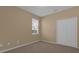 Bright bedroom with a window, closet, and neutral walls at 1107 Pine Oak Trl, Sanford, FL 32773