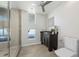 Modern bathroom with a large walk-in shower and dark vanity at 155 S Court Ave # 2908, Orlando, FL 32801