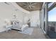 Bright bedroom with city view and a ceiling fan at 155 S Court Ave # 2908, Orlando, FL 32801