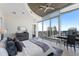 Primary bedroom with stunning city views, king bed, and ample space at 155 S Court Ave # 2908, Orlando, FL 32801
