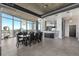 Open concept dining area with modern table and city views at 155 S Court Ave # 2908, Orlando, FL 32801