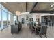 Modern dining area with a large table and city views at 155 S Court Ave # 2908, Orlando, FL 32801