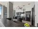 Modern kitchen with dark cabinetry and stainless steel appliances at 155 S Court Ave # 2908, Orlando, FL 32801