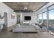Spacious living room with floor to ceiling windows, modern furniture, and city views at 155 S Court Ave # 2908, Orlando, FL 32801