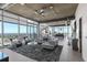 Open concept living space with city views and modern furnishings at 155 S Court Ave # 2908, Orlando, FL 32801