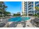 Inviting resort-style pool with ample lounge chairs at 155 S Court Ave # 2908, Orlando, FL 32801