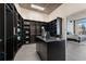Large walk-in closet with shelving and hanging space, plus a view into the bedroom at 155 S Court Ave # 2908, Orlando, FL 32801