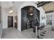 Custom wet bar with black tile, granite countertop, and bar stools at 155 S Court Ave # 2908, Orlando, FL 32801