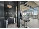 Contemporary wet bar with black tile and a granite countertop at 155 S Court Ave # 2908, Orlando, FL 32801