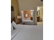 Main bedroom with king-size bed and view of bathroom at 12521 Floridays Resort Dr # 207F, Orlando, FL 32821