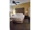 Main bedroom with king-size bed and nightstands at 12521 Floridays Resort Dr # 207F, Orlando, FL 32821