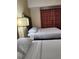 Bedroom with two beds and patterned curtains at 12521 Floridays Resort Dr # 207F, Orlando, FL 32821