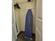 Closet with shelving, hanging rods, and an ironing board at 12521 Floridays Resort Dr # 207F, Orlando, FL 32821