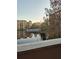 Resort-style community with lake, pool, and lush landscaping at 12521 Floridays Resort Dr # 207F, Orlando, FL 32821