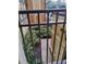 Landscaped courtyard with tropical plants and building access at 12521 Floridays Resort Dr # 207F, Orlando, FL 32821