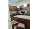 Modern kitchen with stainless steel appliances and an island at 12521 Floridays Resort Dr # 207F, Orlando, FL 32821
