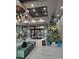 Festive lobby featuring a large Christmas tree and modern decor at 12521 Floridays Resort Dr # 207F, Orlando, FL 32821