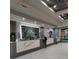 Lobby with a stunning marble reception desk and modern design at 12521 Floridays Resort Dr # 207F, Orlando, FL 32821