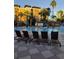 Inviting pool with plenty of lounge chairs at 12521 Floridays Resort Dr # 207F, Orlando, FL 32821