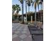 Relaxing pool area with lounge chairs and hot tub at 12521 Floridays Resort Dr # 207F, Orlando, FL 32821