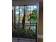 View of a resort pool through a fence at 12521 Floridays Resort Dr # 207F, Orlando, FL 32821