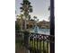 Resort-style pool with palm trees and water features at 12521 Floridays Resort Dr # 207F, Orlando, FL 32821